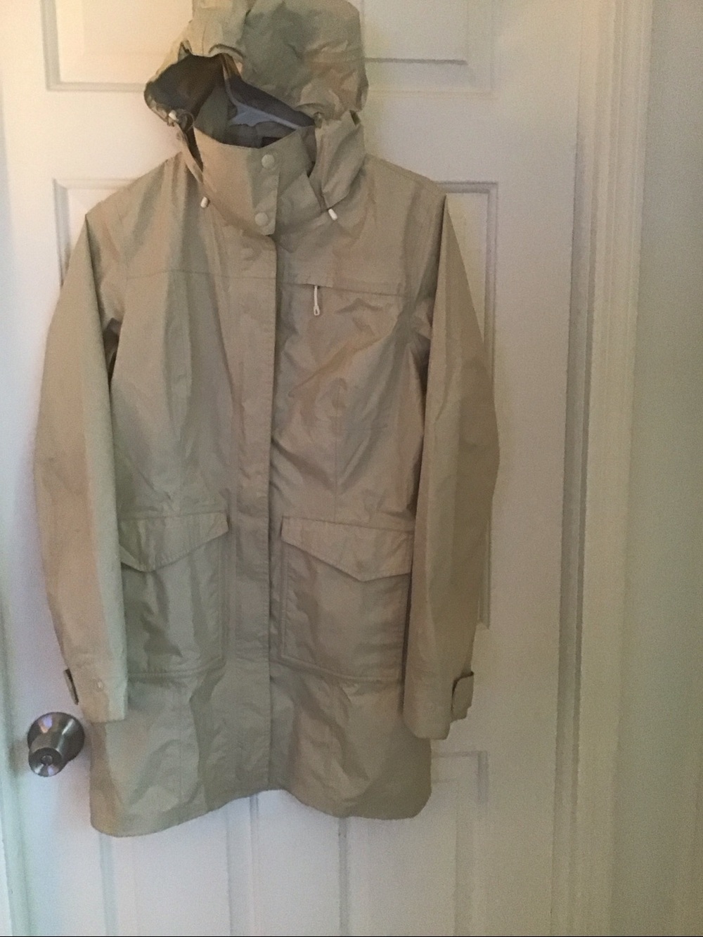 Patagonia tan raincoat with detachable Hood size small